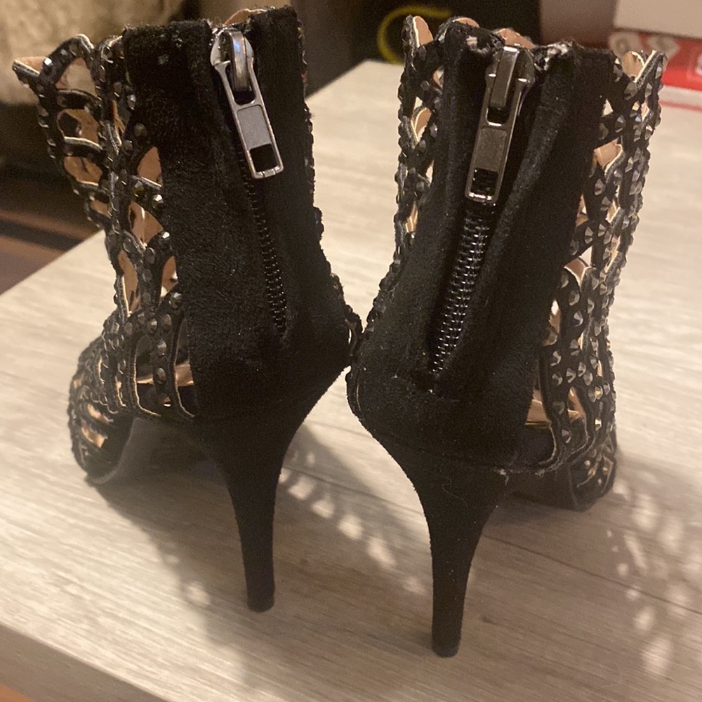 These cute black heels with jewels all over the shoe is great for clubbing.